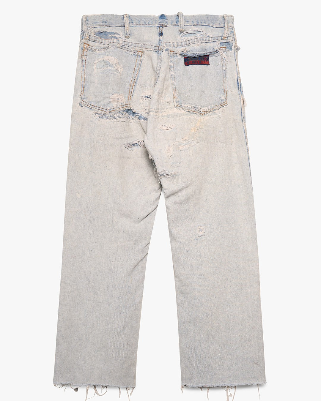 Thrashed/Repaired Wrangler Light Wash Denim Jeans