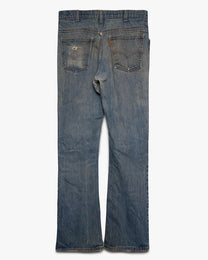 Faded &amp; Repaired Levi's Bootcut Jeans